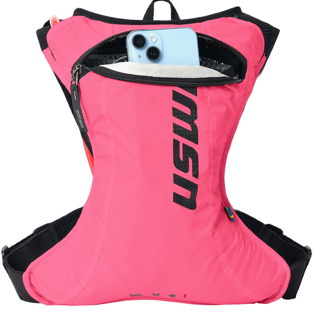 USWE lightweight race hydration pack in pink with black shoulder straps and zippered front pocket holding smartphone, showing minimalist design and ergonomic fit system for mountain biking and gravel racing.